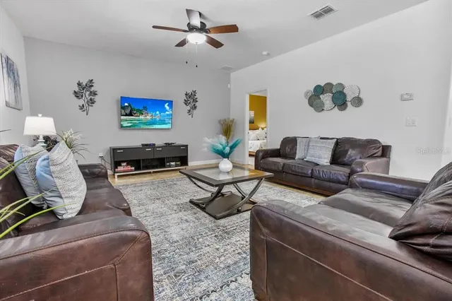 a living room with furniture and a couch