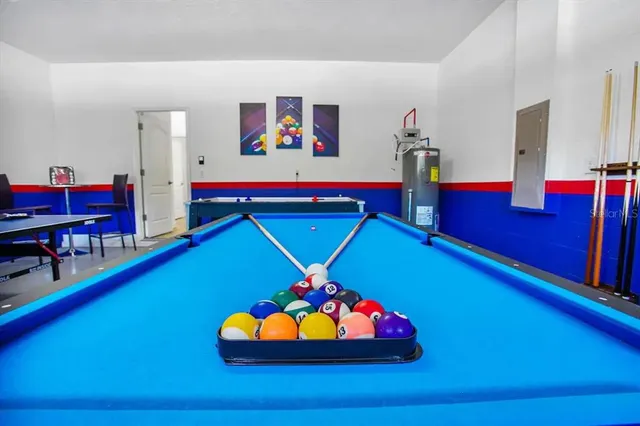 a room with musical instruments and air hockey table