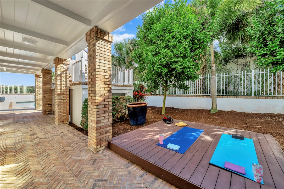 176 Ocean Way Vero Beach, FL 32963 - Photo 32 of 36 a view of a backyard with wooden floor and fence
