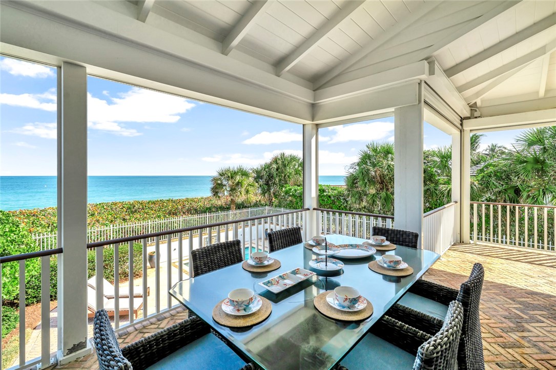 176 Ocean Way Vero Beach, FL 32963 - Photo 34 of 36 a view of a patio with furniture and garden