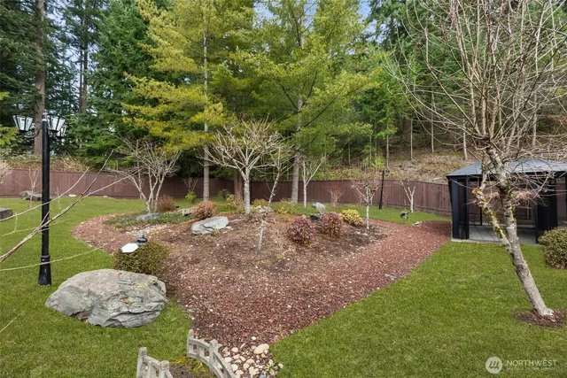 a backyard of a house with seating space