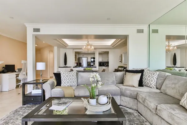 a living room with furniture and a rug