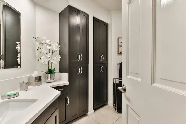 a bathroom with a sink and a mirror