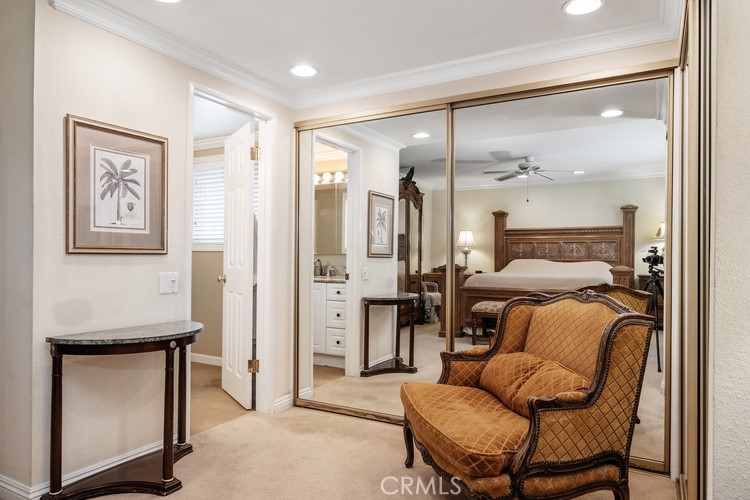 9331 Cape Cod Drive Huntington Beach, CA 92646 - Photo 18 of 31 a bedroom with furniture and a closet