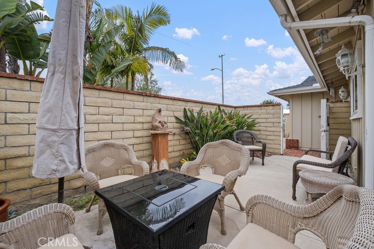 9331 Cape Cod Drive Huntington Beach, CA 92646 - Photo 31 of 31 a outdoor living space with patio furniture