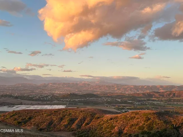 a view of an outdoor space and mountain view