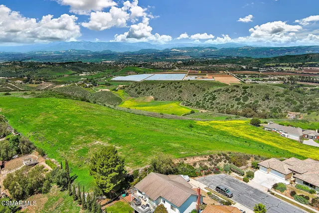 a view of a city with an ocean