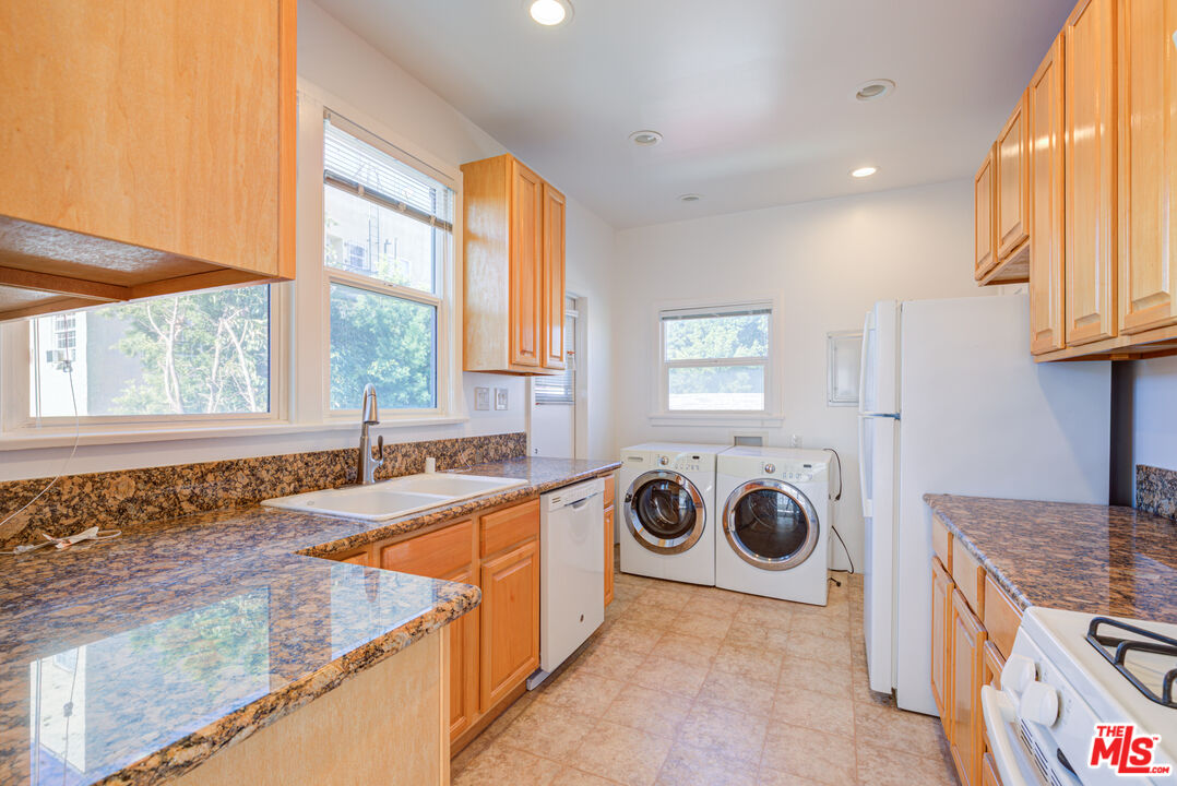 1447 North Vista Street, Unit 1/2 Los Angeles, CA 90046 - Photo 11 of 23 a view of a kitchen with a sink and a stove top oven