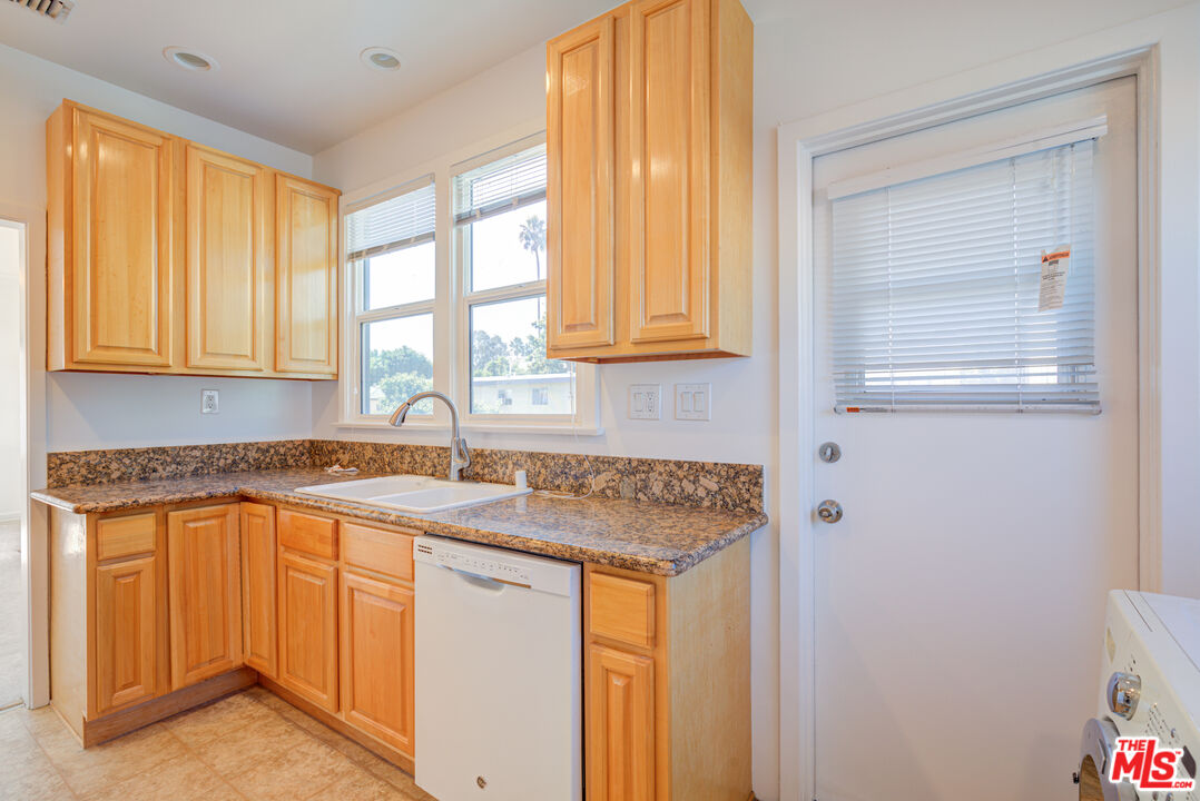 1447 North Vista Street, Unit 1/2 Los Angeles, CA 90046 - Photo 14 of 23 a view of a sink a window and an entryway