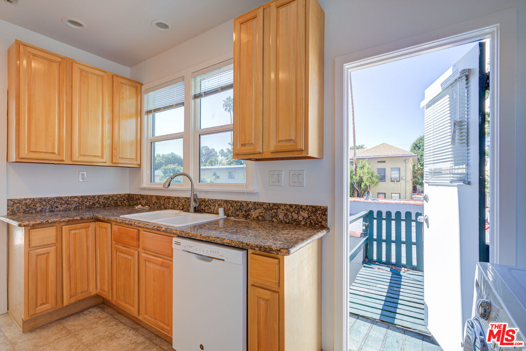1447 North Vista Street, Unit 1/2 Los Angeles, CA 90046 - Photo 15 of 23 a kitchen that has a sink and a window