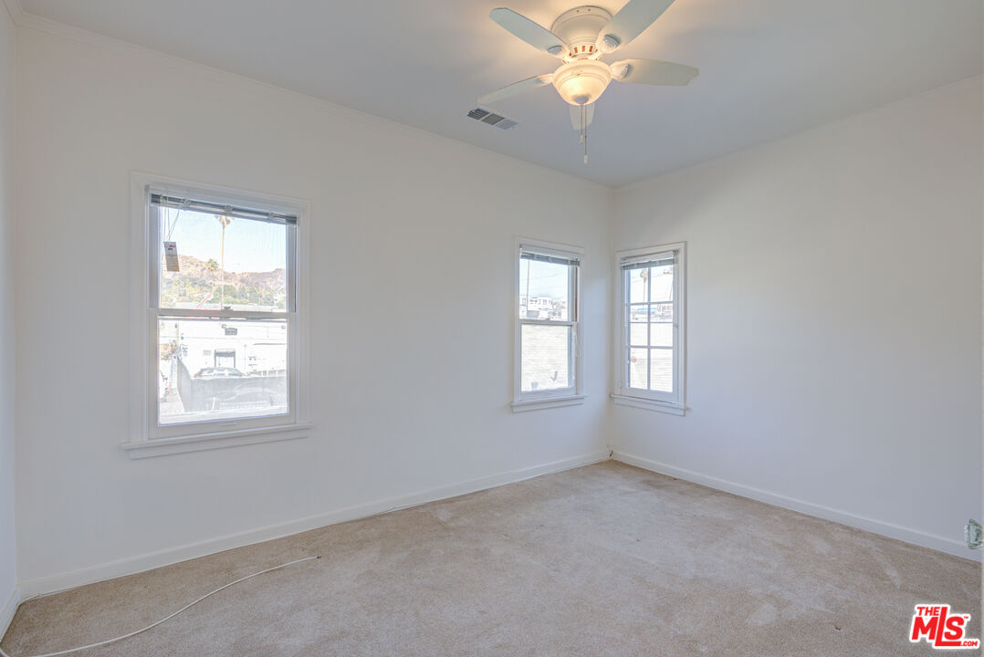 1447 North Vista Street, Unit 1/2 Los Angeles, CA 90046 - Photo 17 of 23 a view of an empty room with a window