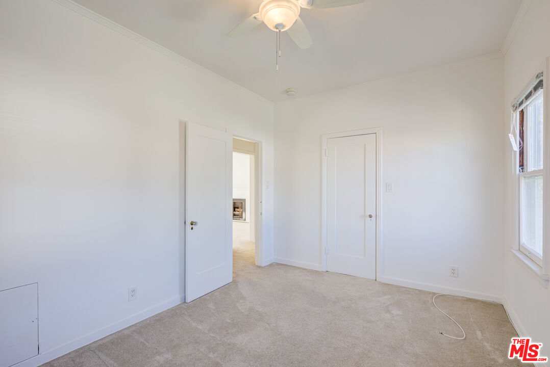 1447 North Vista Street, Unit 1/2 Los Angeles, CA 90046 - Photo 18 of 23 a view of an empty room with a window