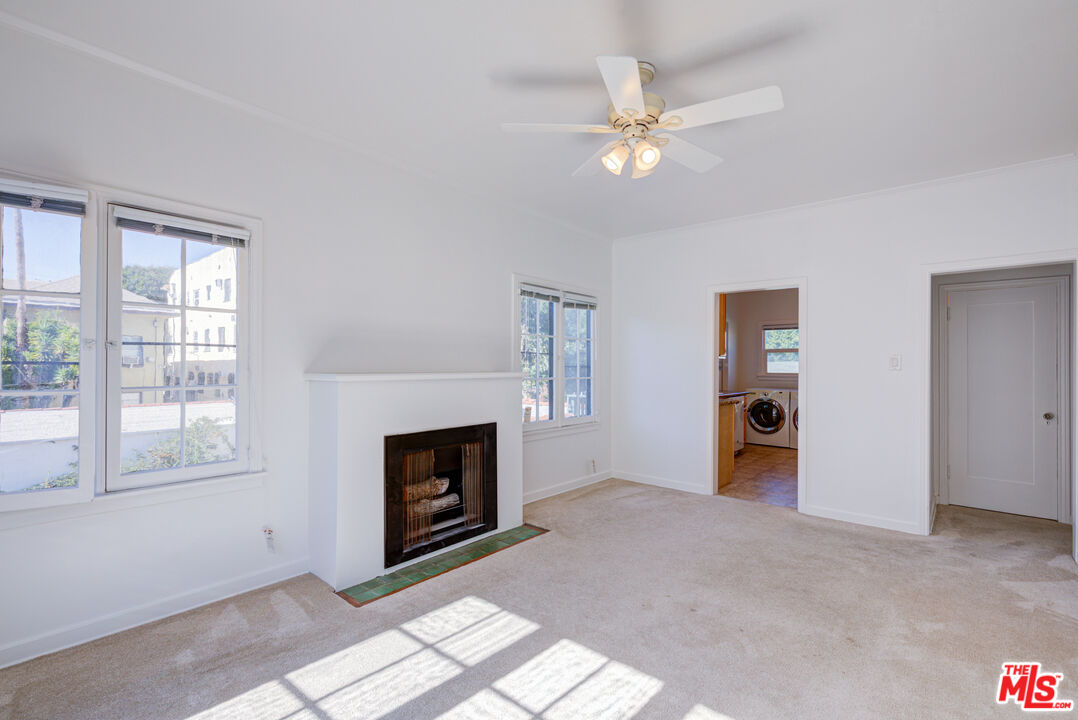 1447 North Vista Street, Unit 1/2 Los Angeles, CA 90046 - Photo 7 of 23 a living room with furniture and a fireplace