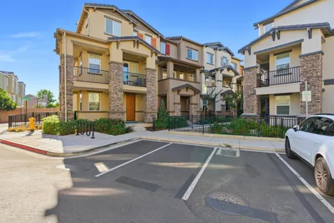 a view of a building with a street