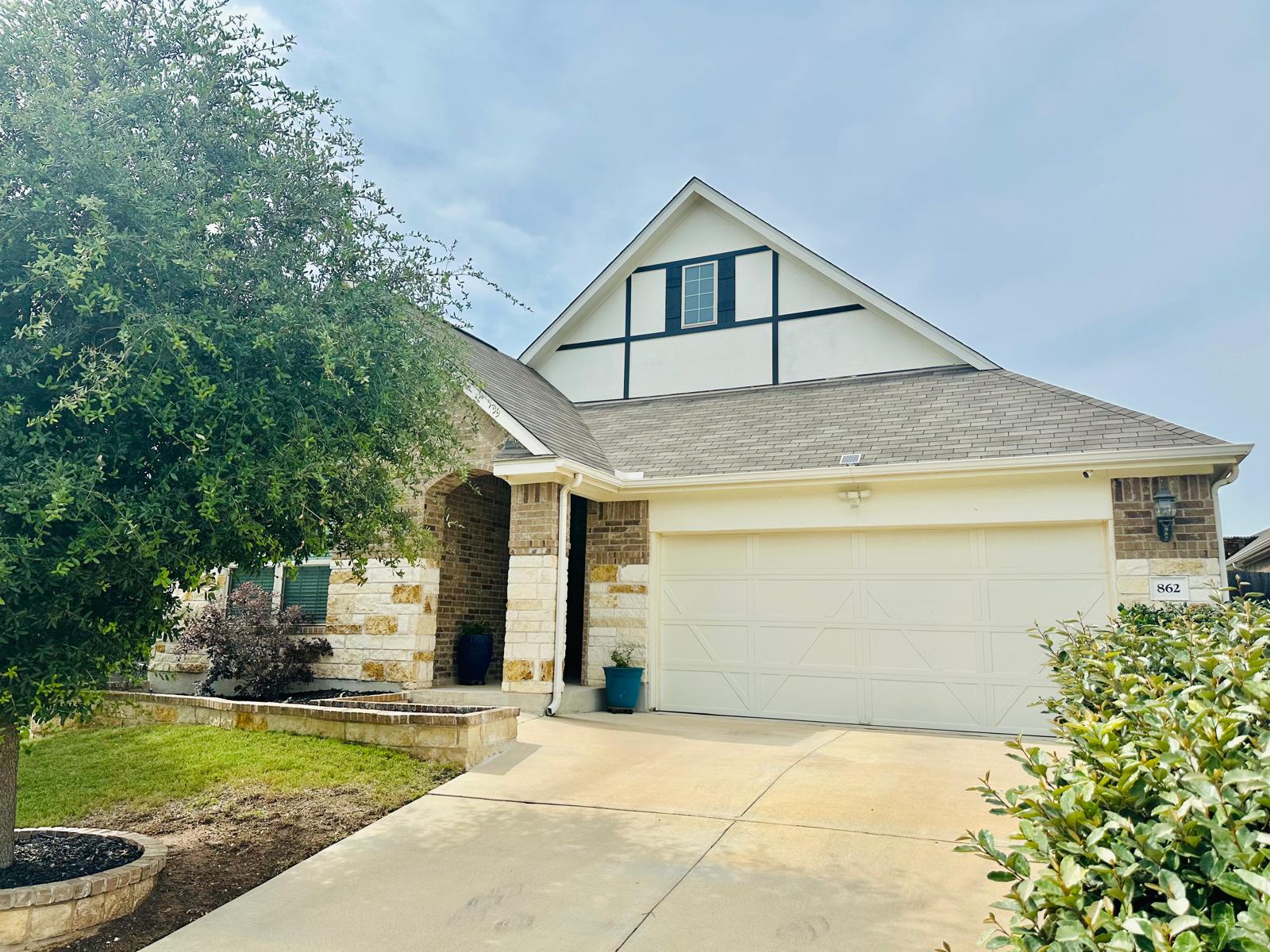 862 Leadtree Loop Buda, TX 78610 - Photo 1 of 40 a house view with a outdoor space