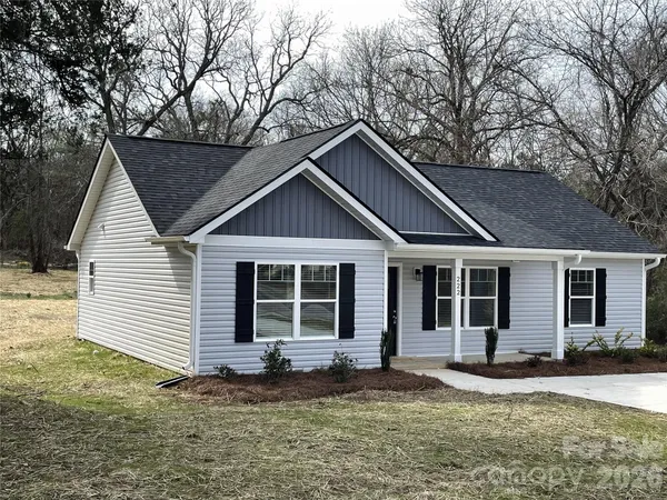 a house with yard in front of it