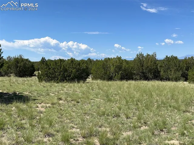 a view of an outdoor space and mountain view
