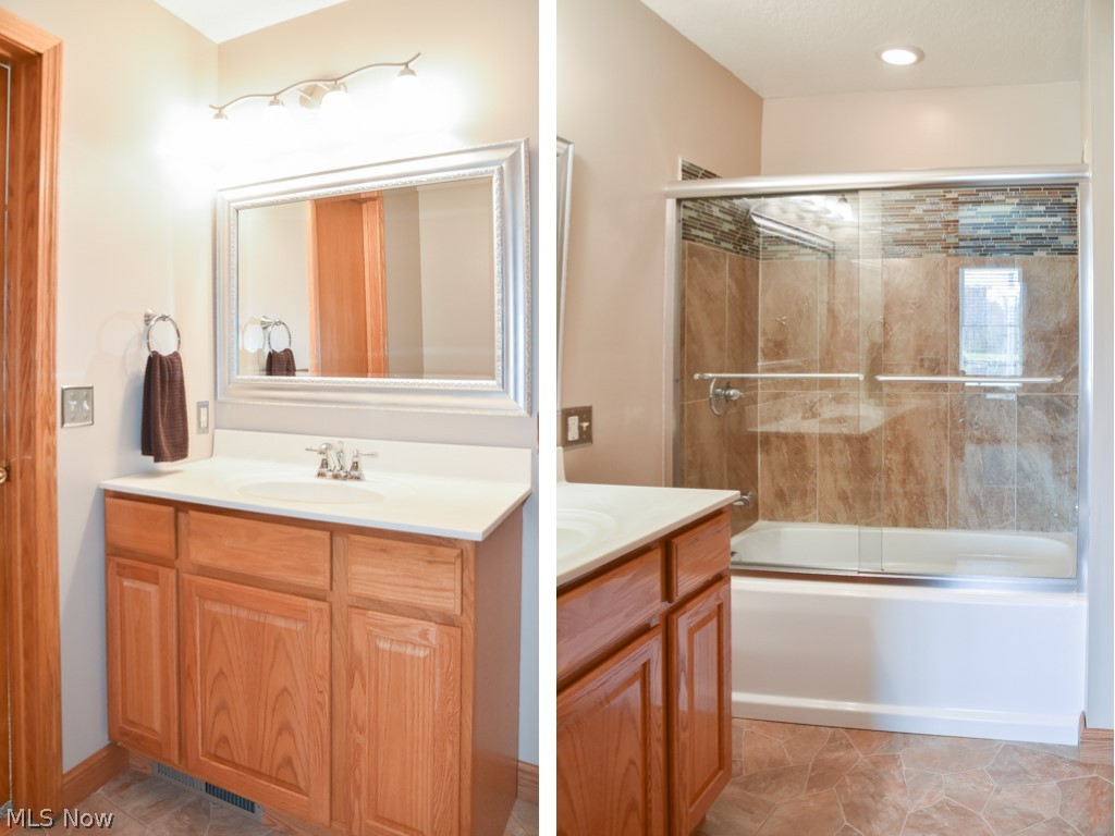 2651 Killian Road Uniontown, OH 44685 - Photo 14 of 25 Private master bath with tile shower surround.