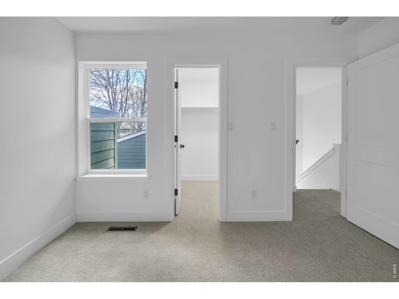 4240 Corriente Place Boulder, CO 80301 - Photo 14 of 21 a view of an empty room with a window