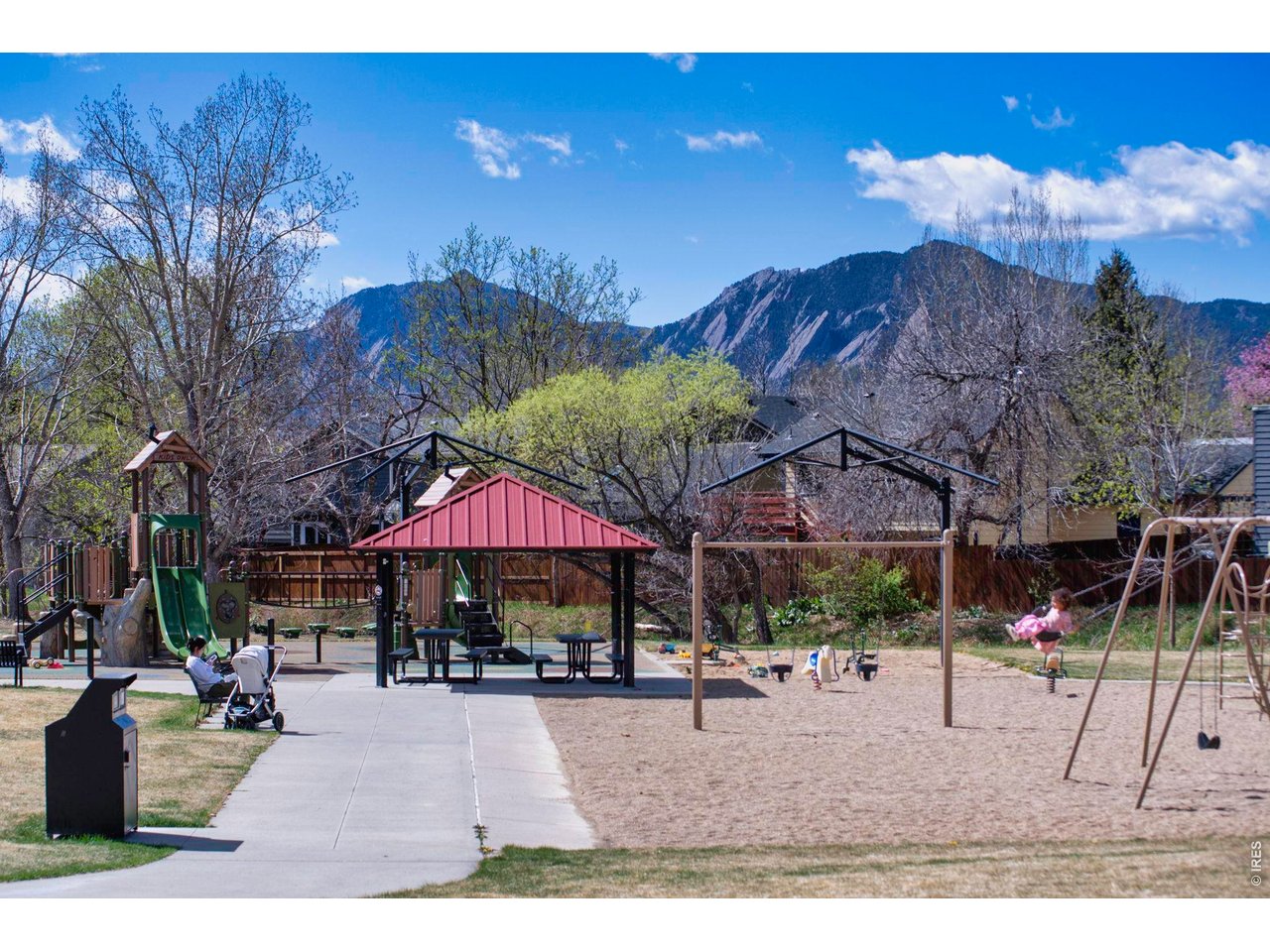 4240 Corriente Place Boulder, CO 80301 - Photo 20 of 21 a view of patio with a table and chairs under an umbrella