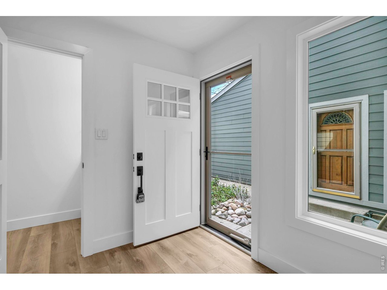 4240 Corriente Place Boulder, CO 80301 - Photo 3 of 21 a view interior of a house and an entryway with wooden floor