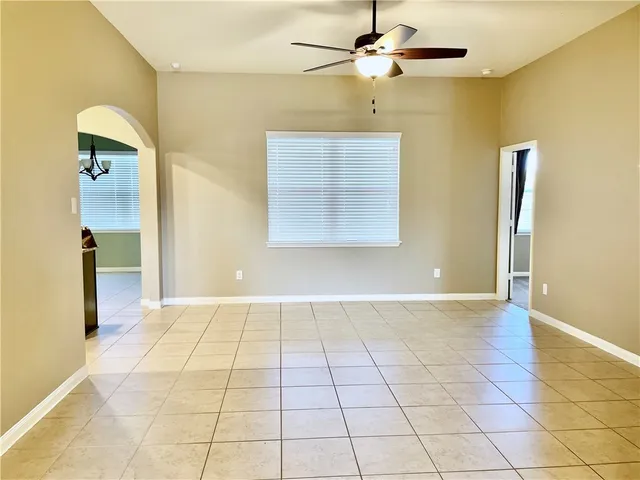 a view of a livingroom with a kitchen