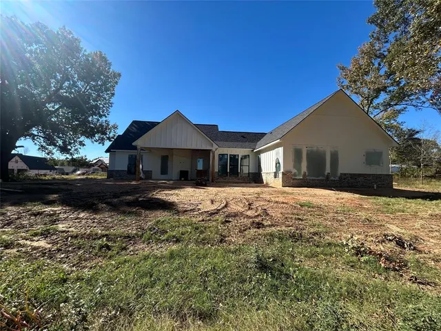 a house view with a garden space