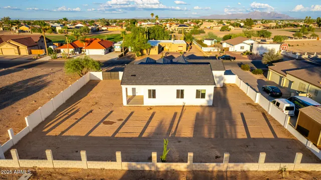 a bathroom with a double vanity sink and mirror