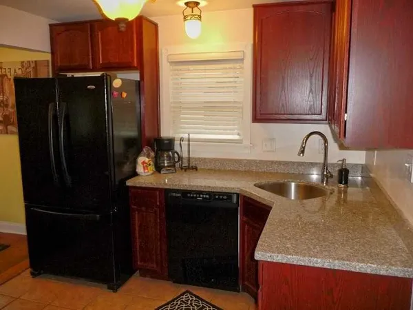 a kitchen with a stove and a microwave