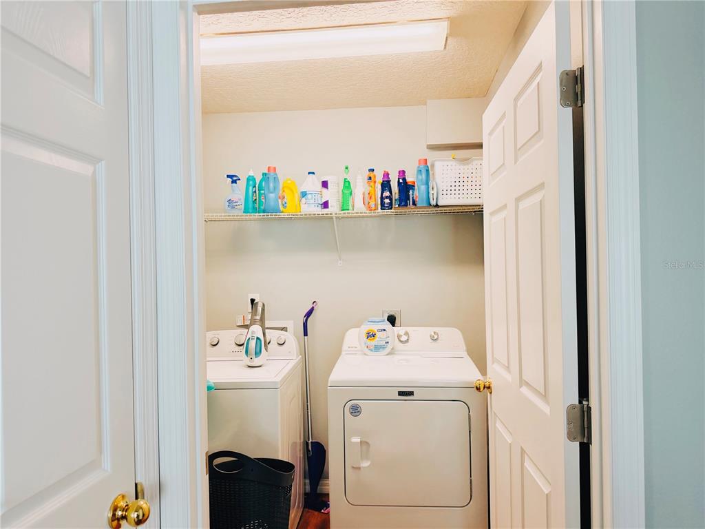 110 Turtle Run Umatilla, FL 32784 - Photo 12 of 15 a utility room with dryer and washer