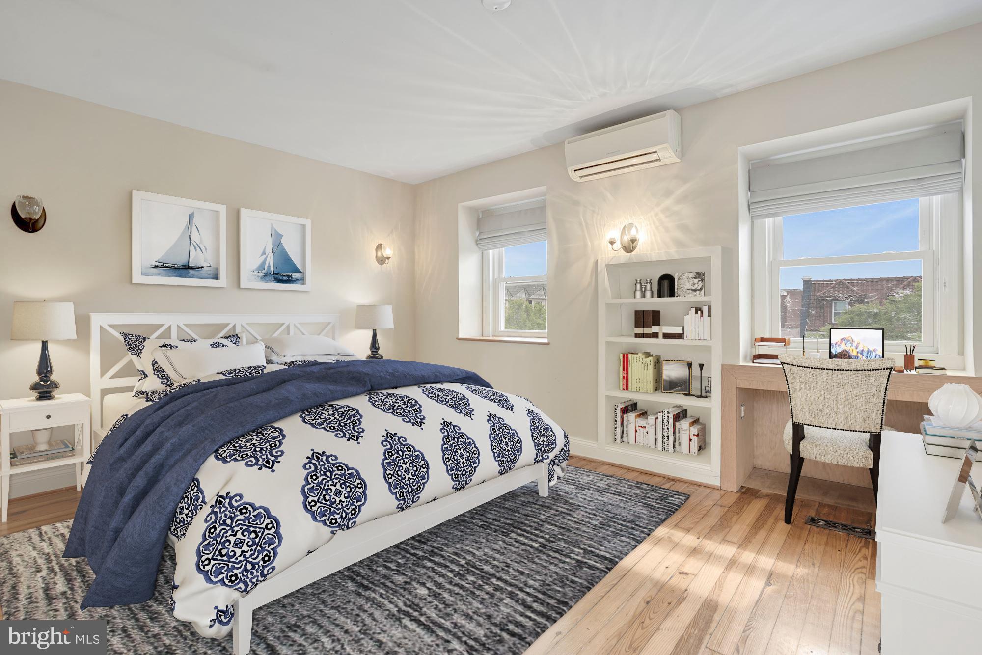 2721 2721-upper Ontario Road Northwest Washington, DC 20009 - Photo 16 of 31 a spacious bedroom with a bed a dresser and next to a window