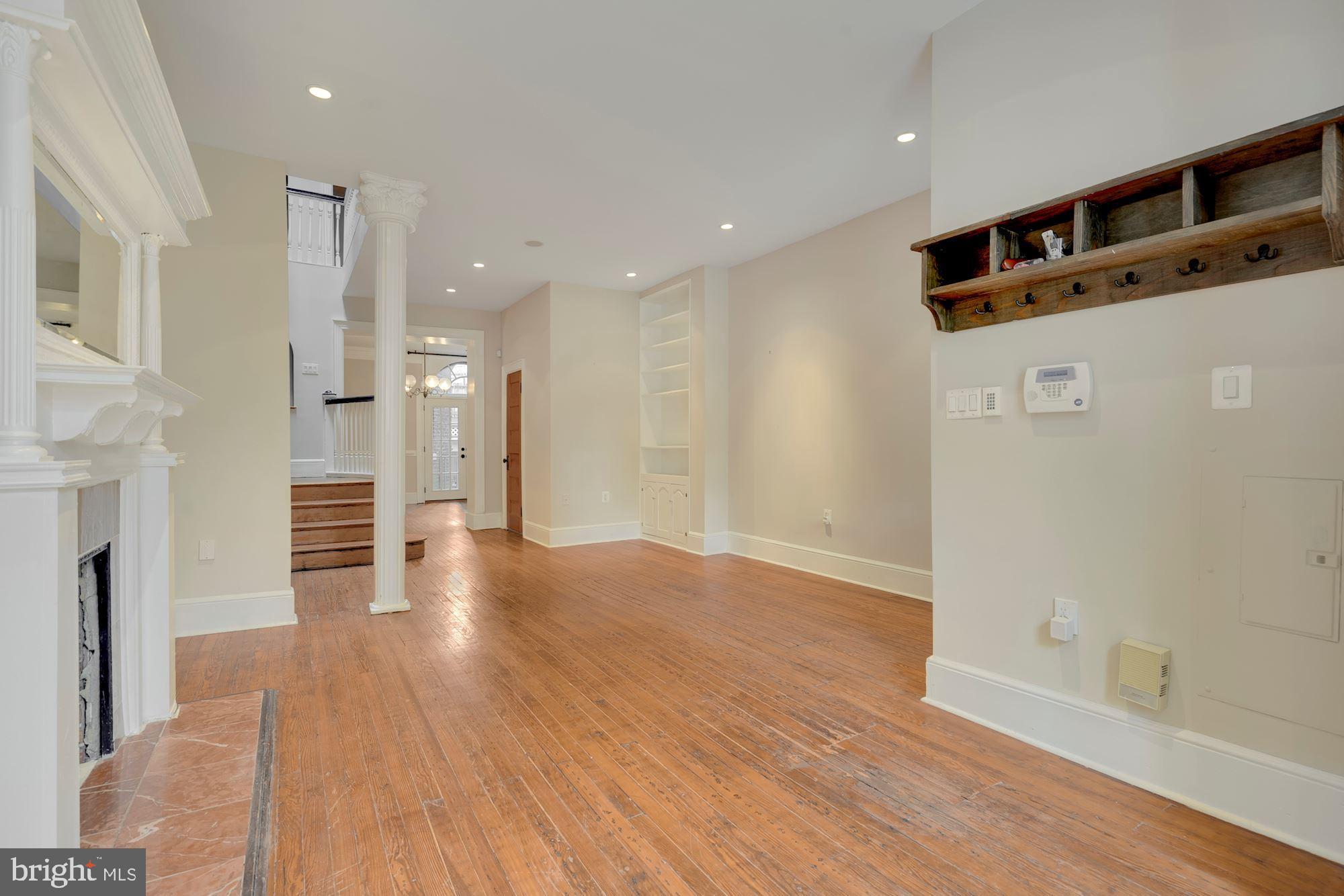2721 2721-upper Ontario Road Northwest Washington, DC 20009 - Photo 4 of 31 a view of livingroom with wooden floor