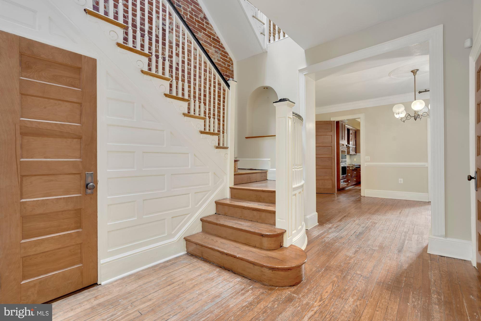 2721 2721-upper Ontario Road Northwest Washington, DC 20009 - Photo 6 of 31 a view of entryway and hall with wooden floor