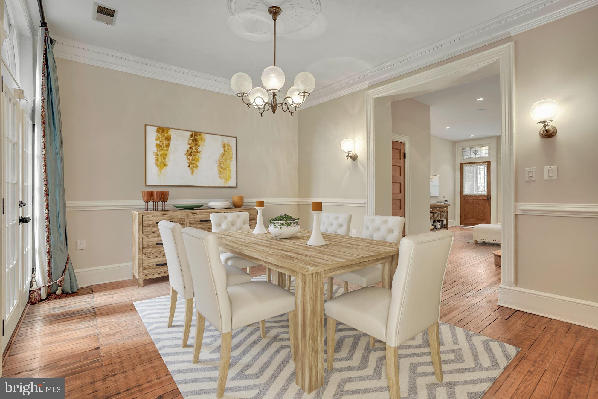 2721 2721-upper Ontario Road Northwest Washington, DC 20009 - Photo 7 of 31 a view of a dining room with furniture and wooden floor