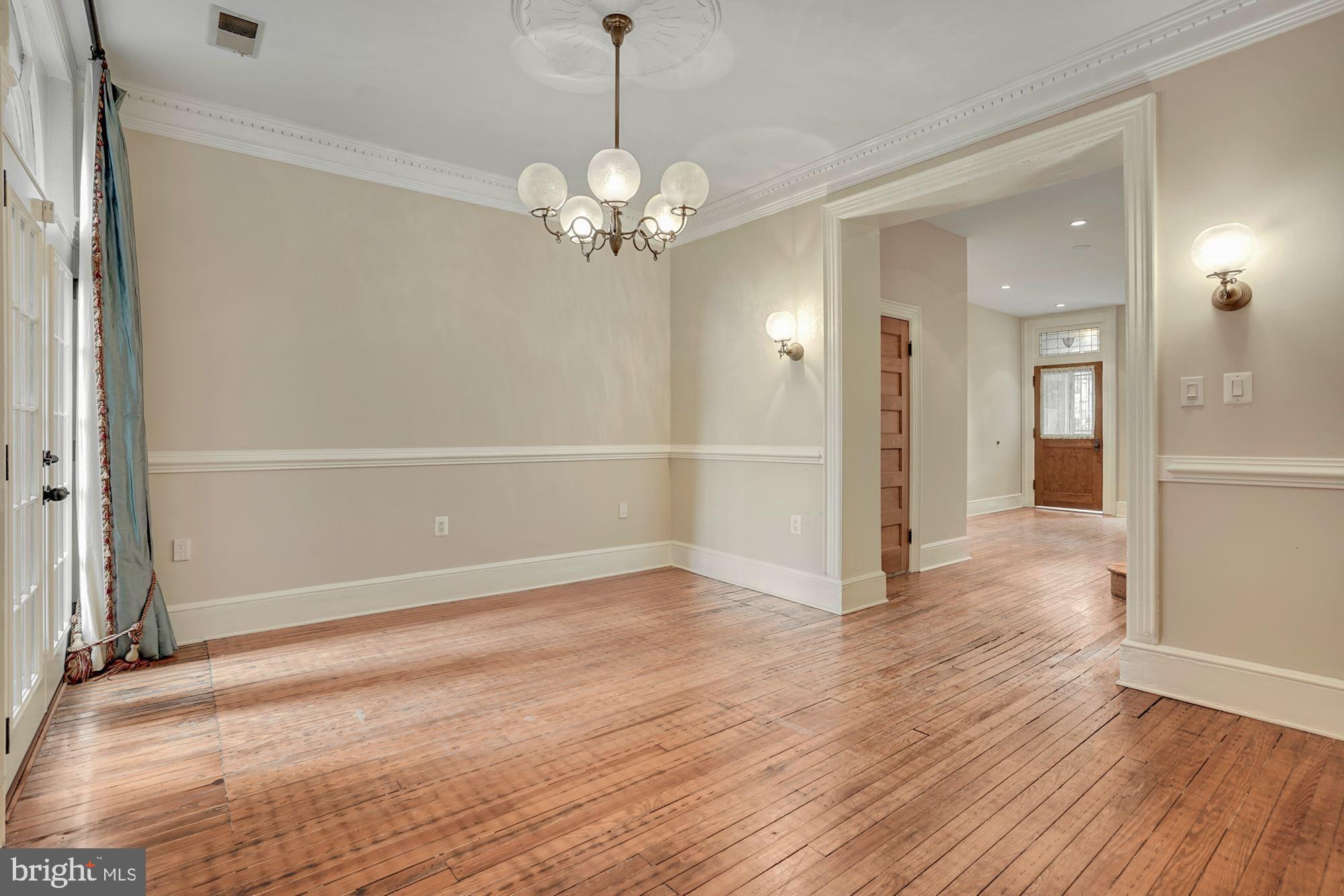 2721 2721-upper Ontario Road Northwest Washington, DC 20009 - Photo 8 of 31 a view of a livingroom with wooden floor