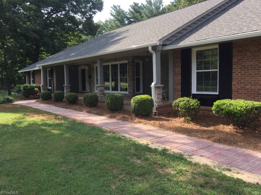 113 Helsabeck Road King, NC 27021 - Photo 1 of 19 Large, covered front porch.