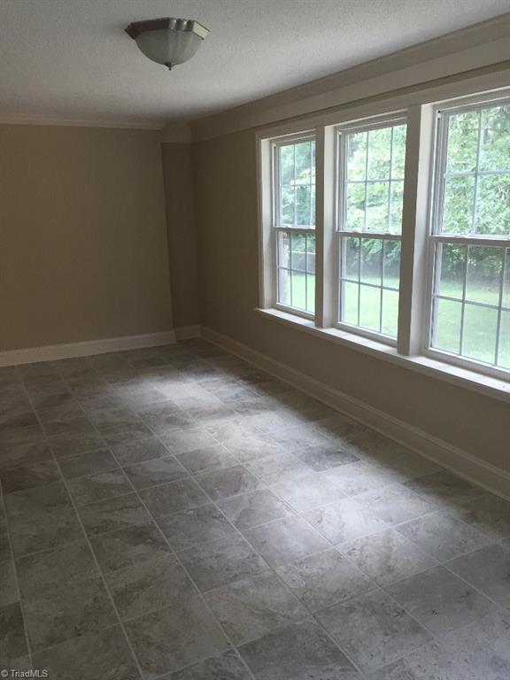 113 Helsabeck Road King, NC 27021 - Photo 15 of 19 This room can be used as a dining, sunroom or office.