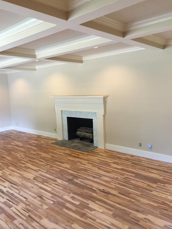 113 Helsabeck Road King, NC 27021 - Photo 4 of 19 Living room. All new hardwood floors and coffered ceilings.
