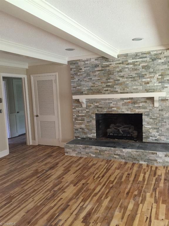 113 Helsabeck Road King, NC 27021 - Photo 6 of 19 Den fireplace