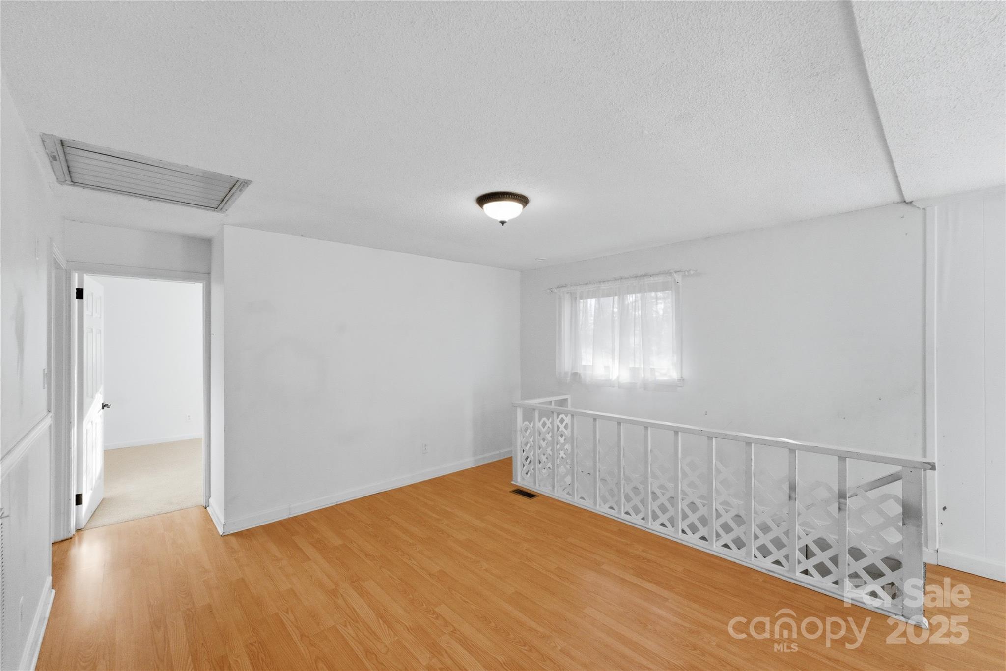 1051 Cox Mill Road Concord, NC 28027 - Photo 12 of 48 a view of an empty room and window