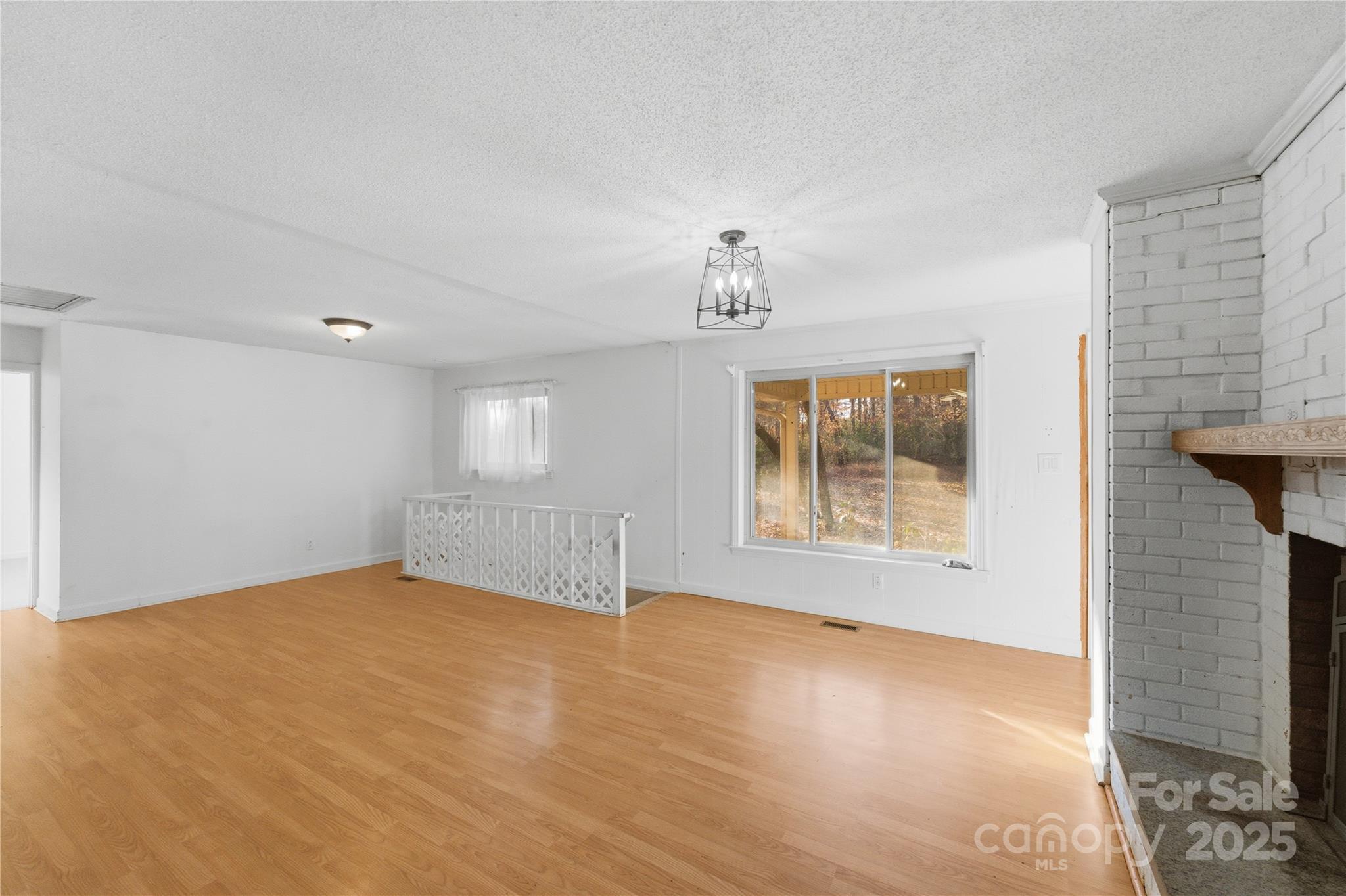 1051 Cox Mill Road Concord, NC 28027 - Photo 13 of 48 a view of an empty room with a window