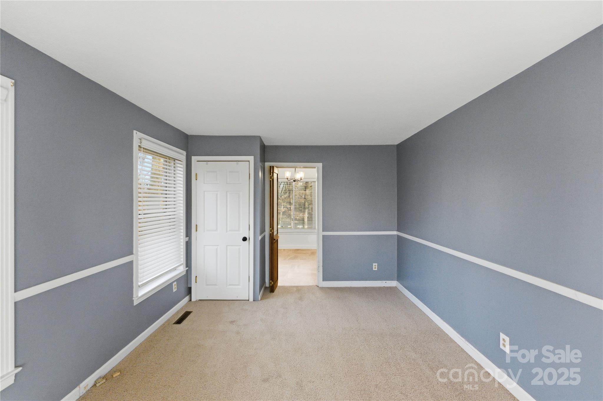 1051 Cox Mill Road Concord, NC 28027 - Photo 21 of 48 a view of an empty room with a window