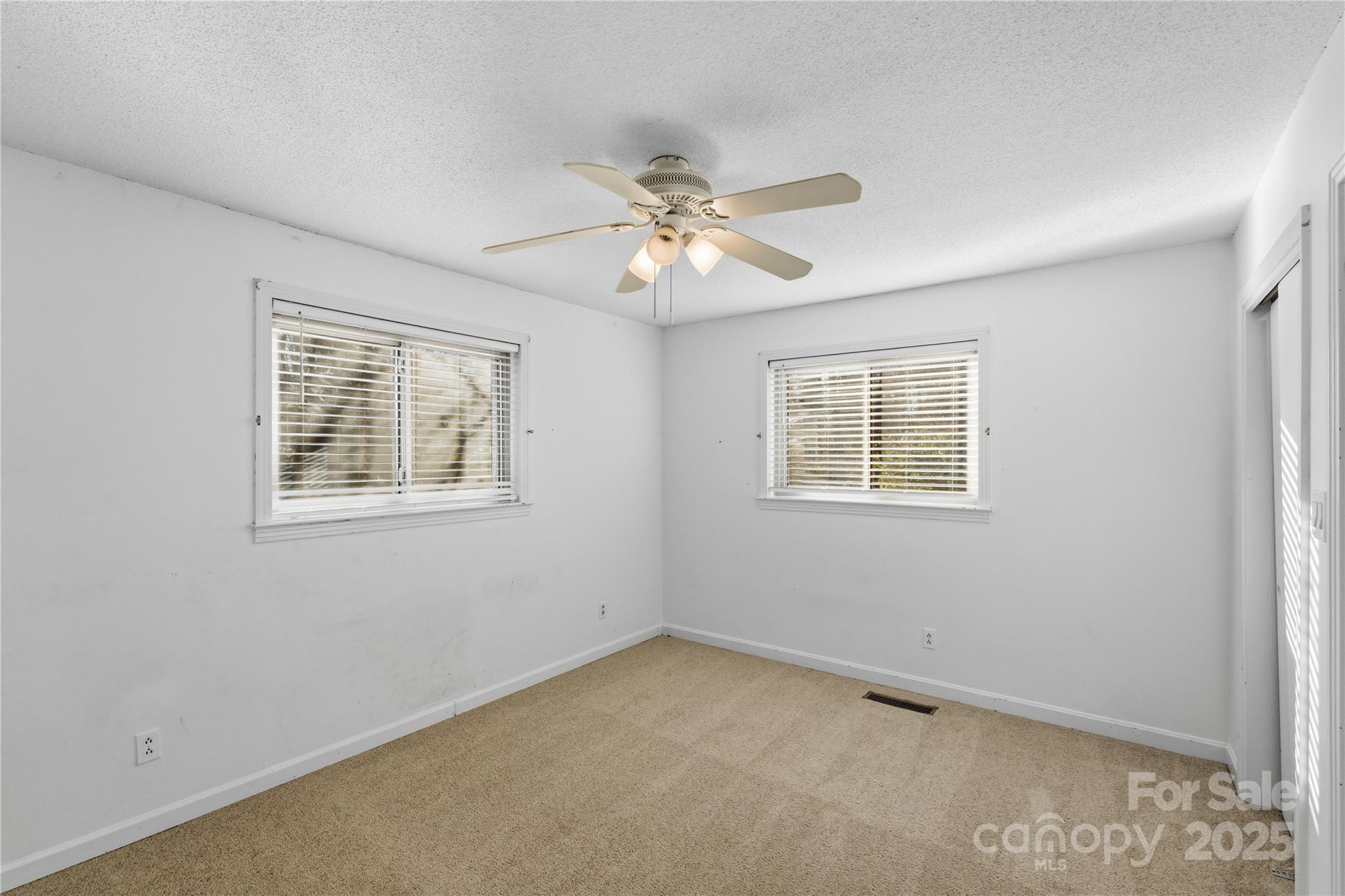 1051 Cox Mill Road Concord, NC 28027 - Photo 23 of 48 a view of an empty room with a window