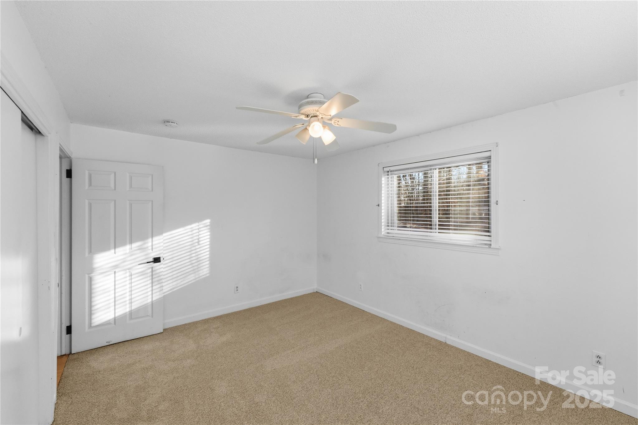 1051 Cox Mill Road Concord, NC 28027 - Photo 24 of 48 a view of an empty room with a window