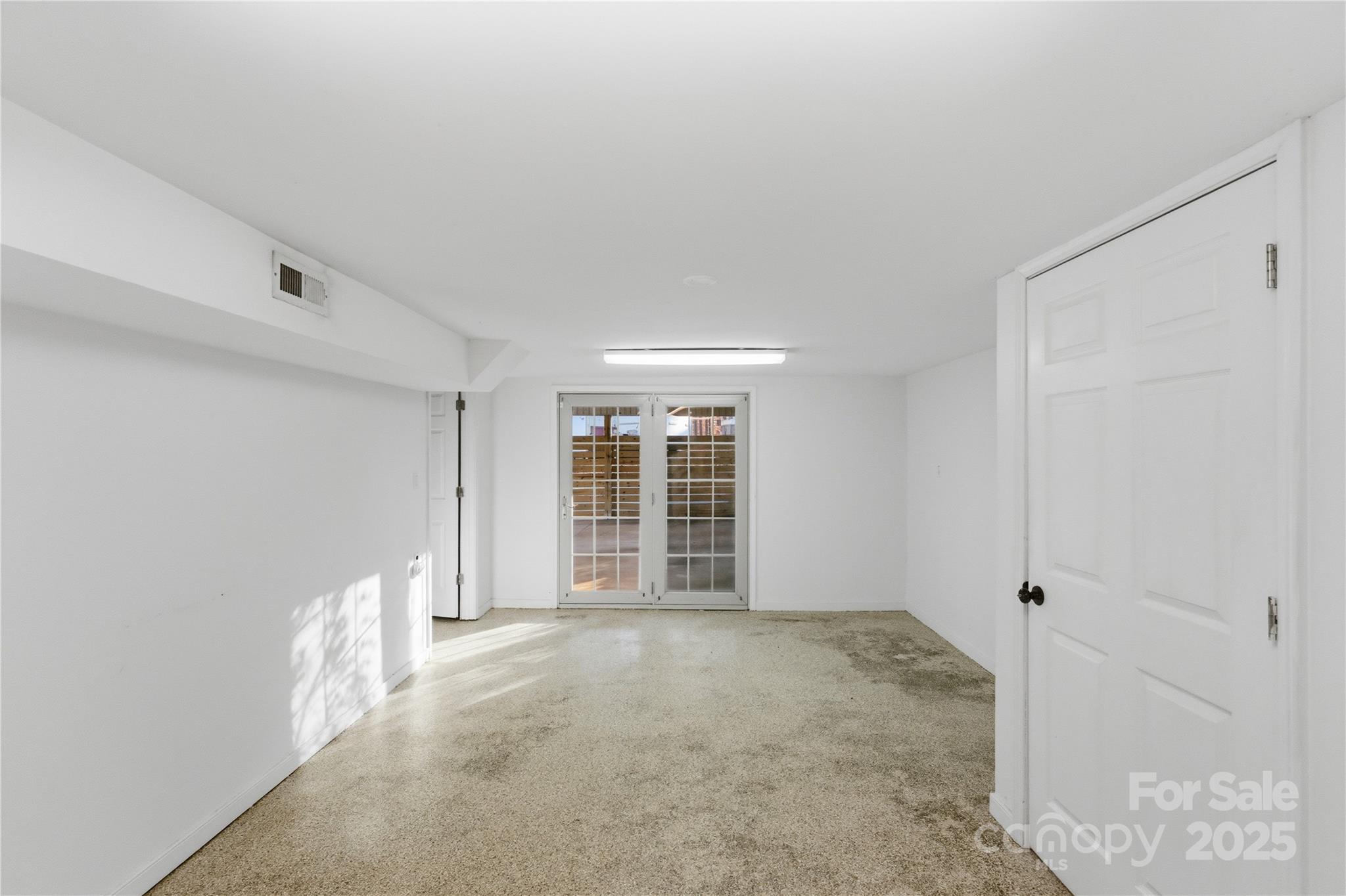 1051 Cox Mill Road Concord, NC 28027 - Photo 30 of 48 a view of an empty room with a window