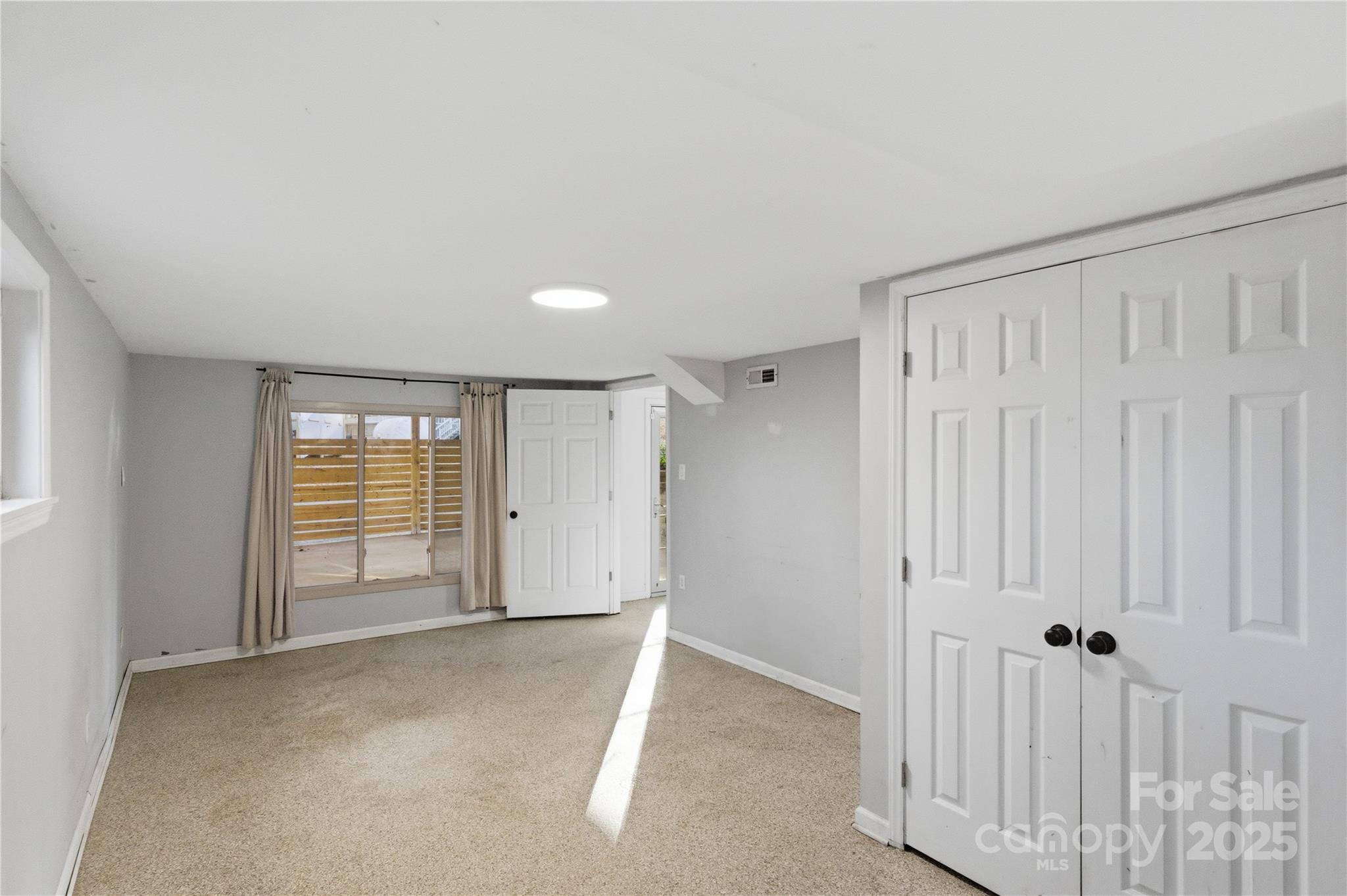 1051 Cox Mill Road Concord, NC 28027 - Photo 33 of 48 an empty room with windows