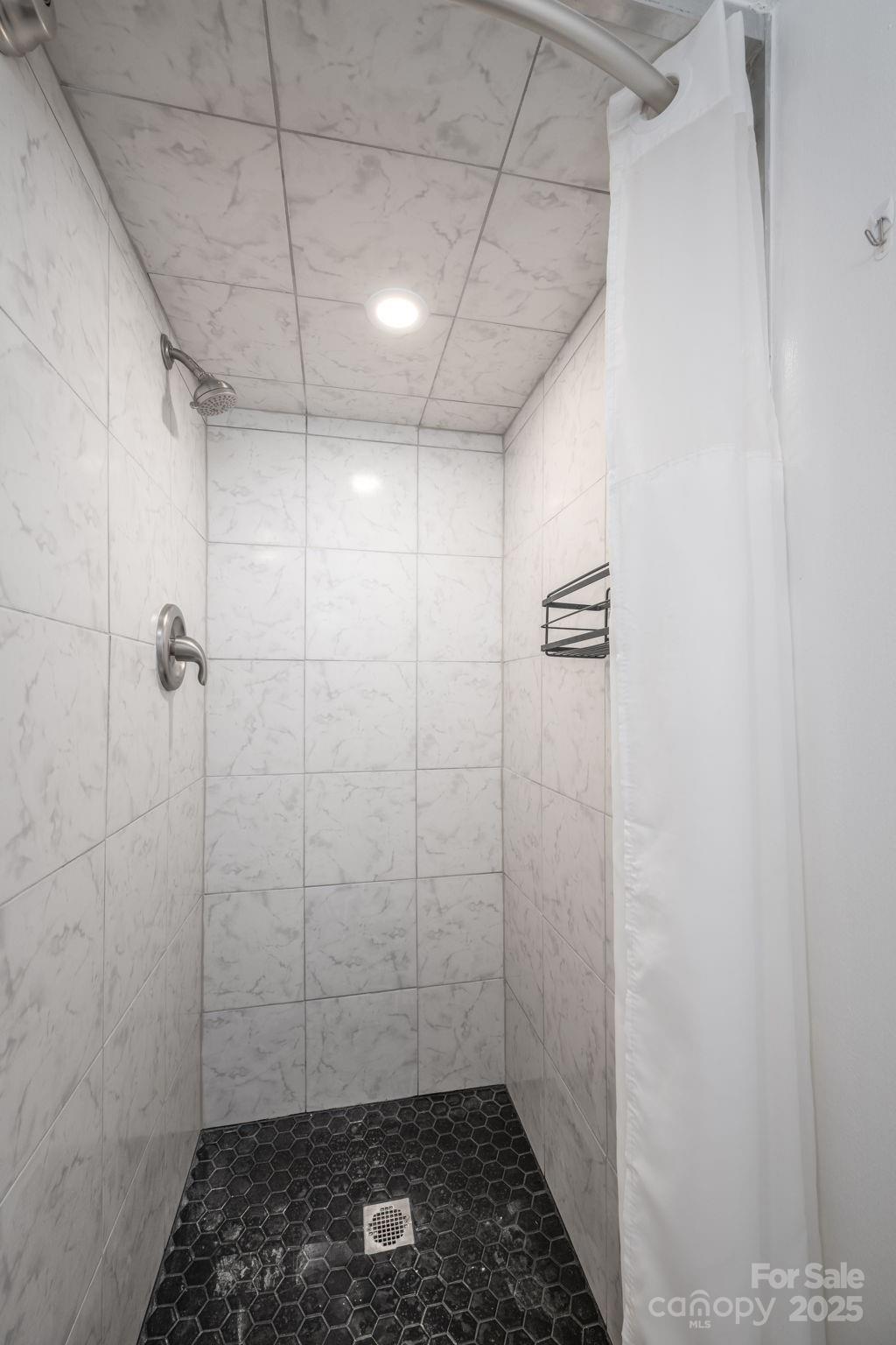 1051 Cox Mill Road Concord, NC 28027 - Photo 35 of 48 a bathroom with a shower