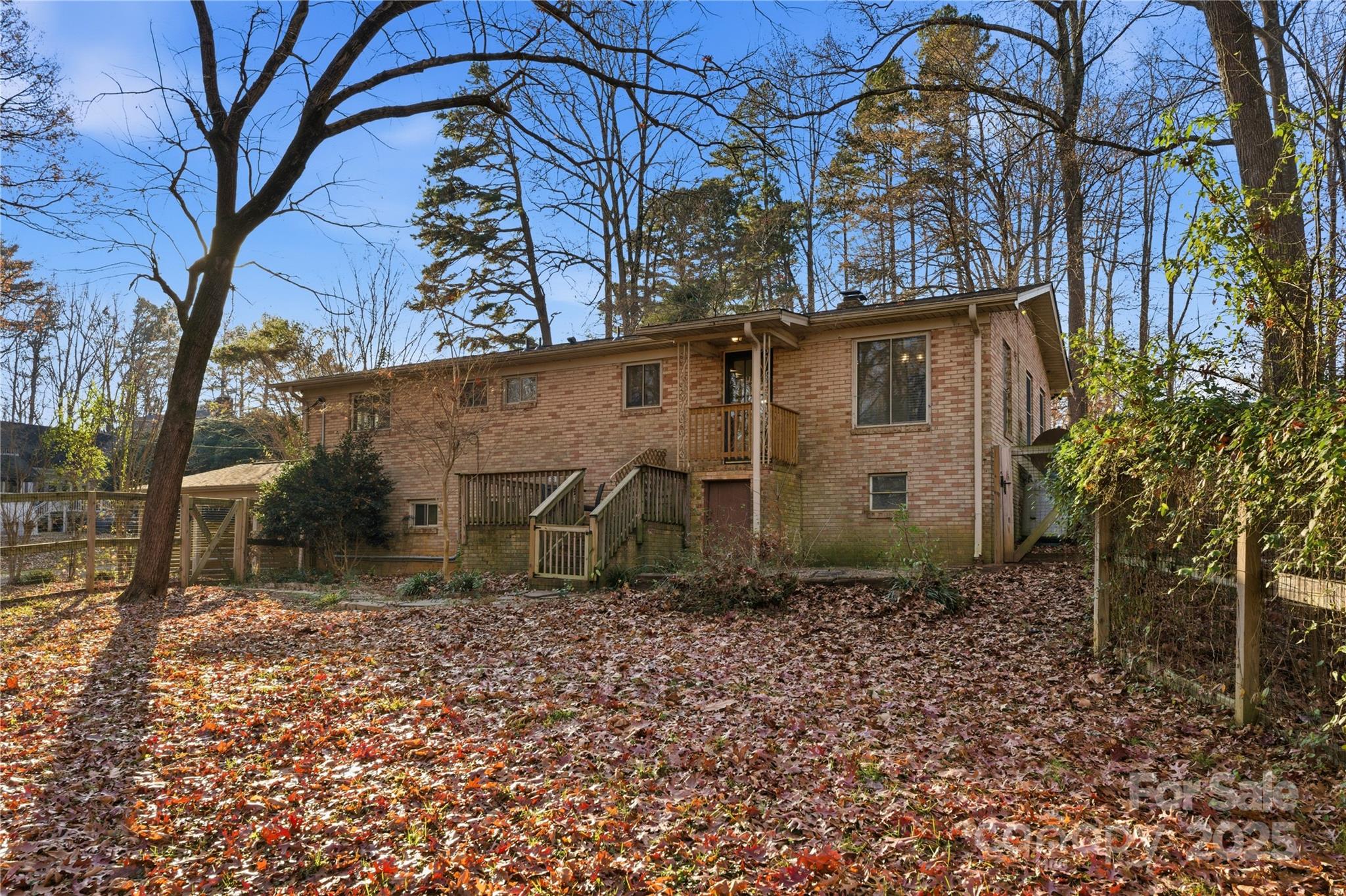 1051 Cox Mill Road Concord, NC 28027 - Photo 44 of 48 a backyard of a house with lots of green space