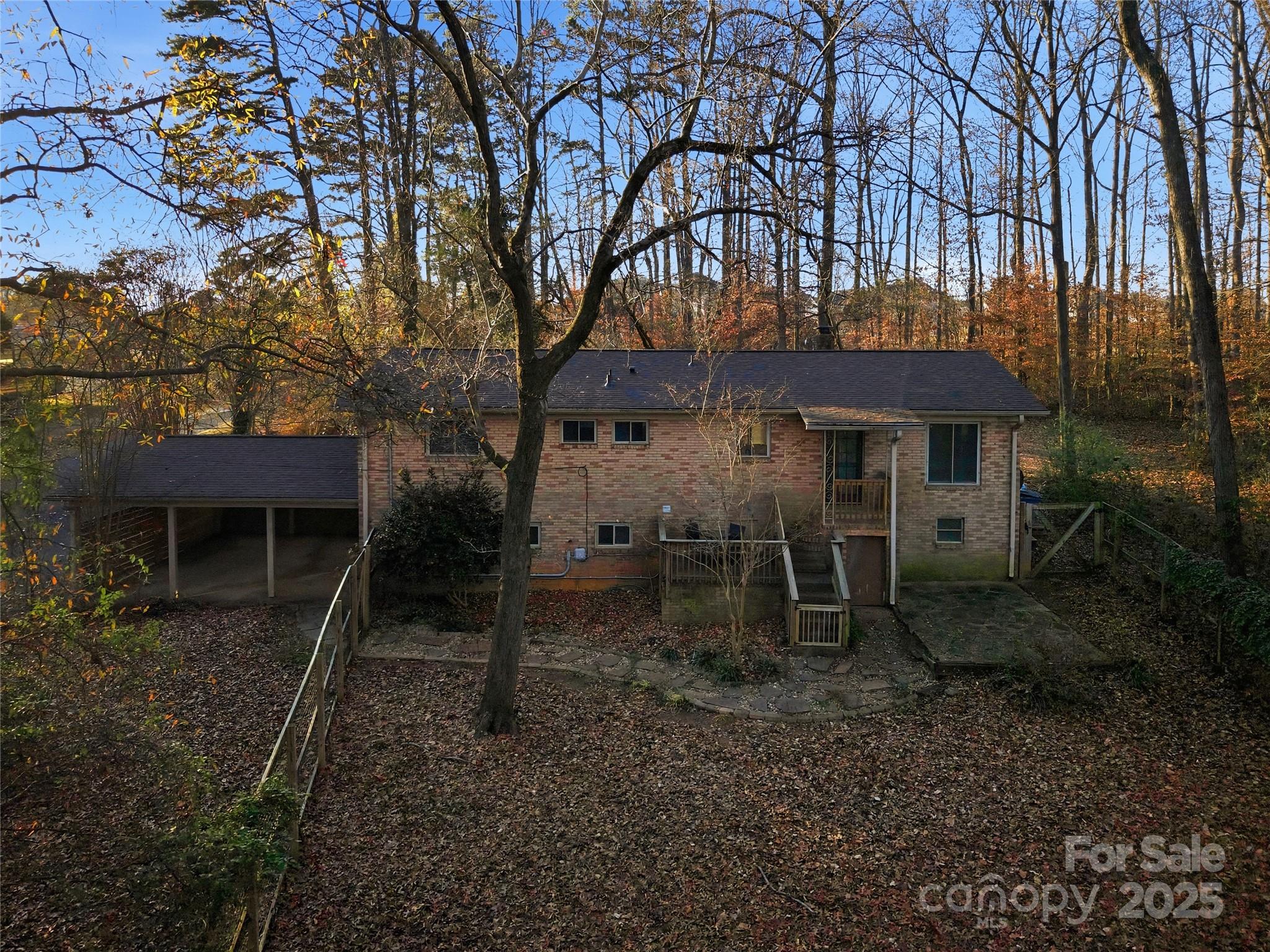 1051 Cox Mill Road Concord, NC 28027 - Photo 46 of 48 a backyard of a house with table and chairs