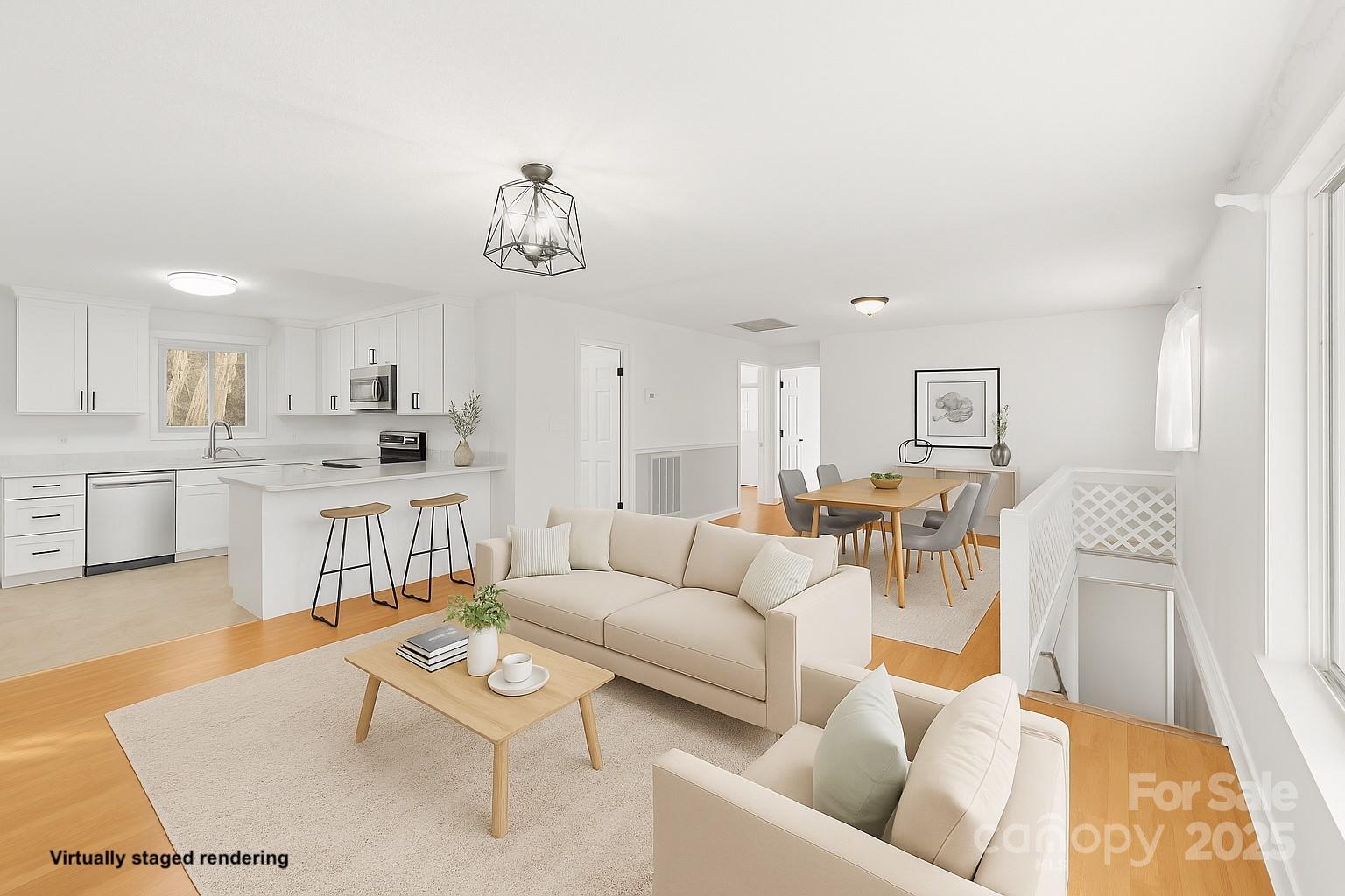 1051 Cox Mill Road Concord, NC 28027 - Photo 8 of 48 a living room with furniture kitchen view and a wooden floor